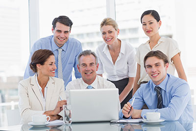 a group of people sitting posing for the camera